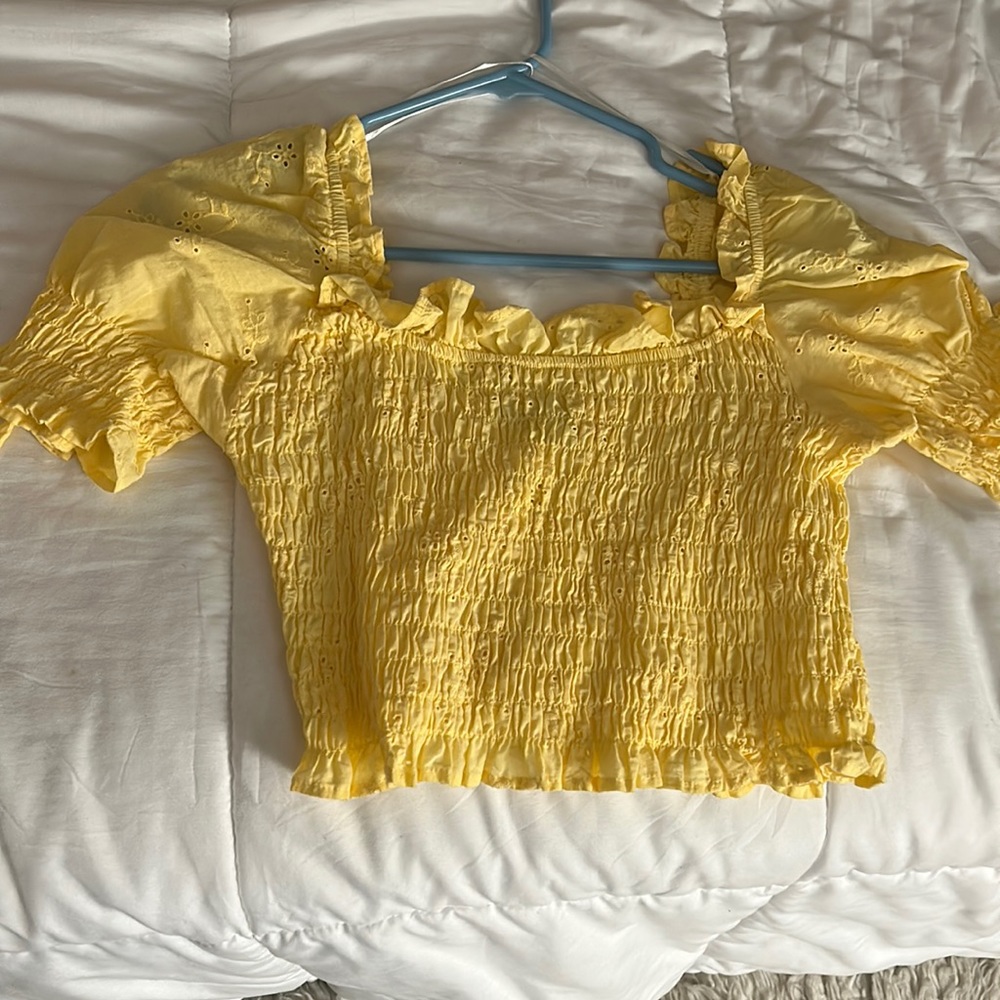 A yellow crop top